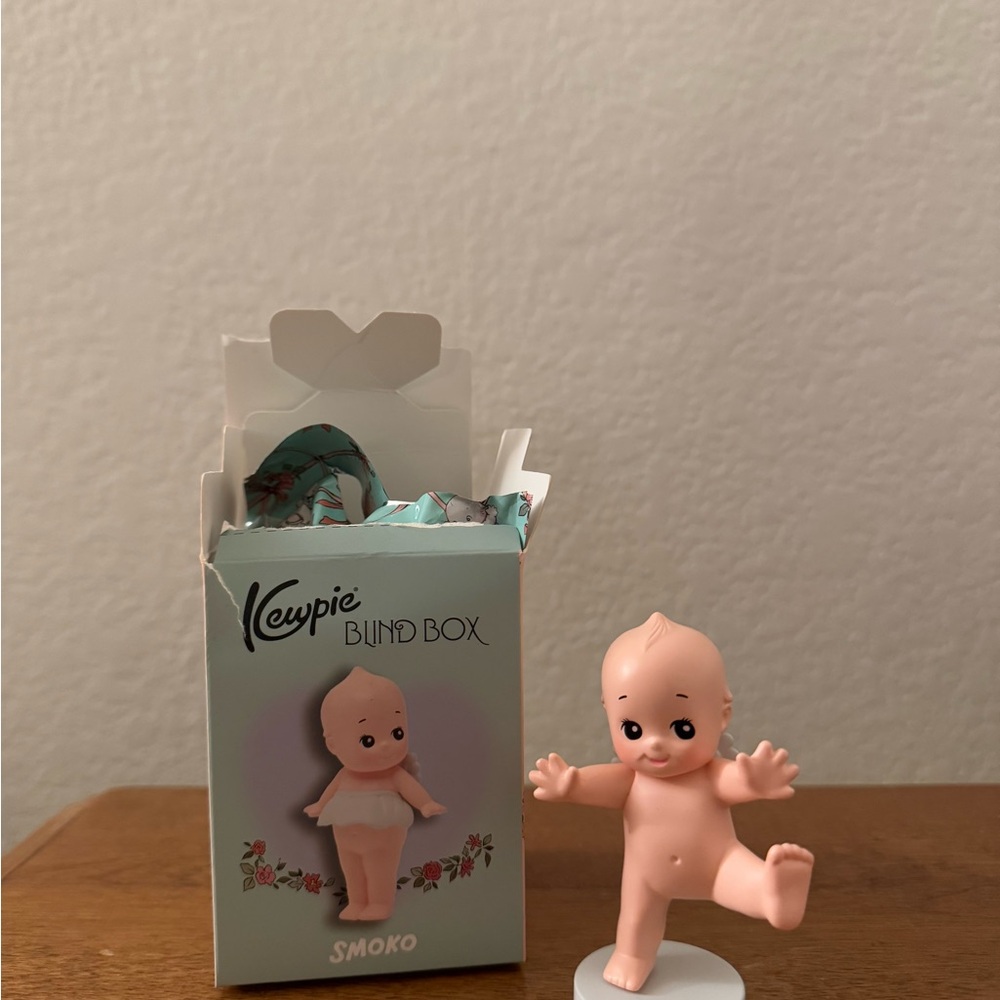 Pink Doll with Heart-Shaped Packaging